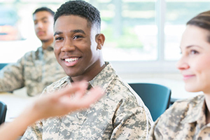 African American soldier listening to someone speak